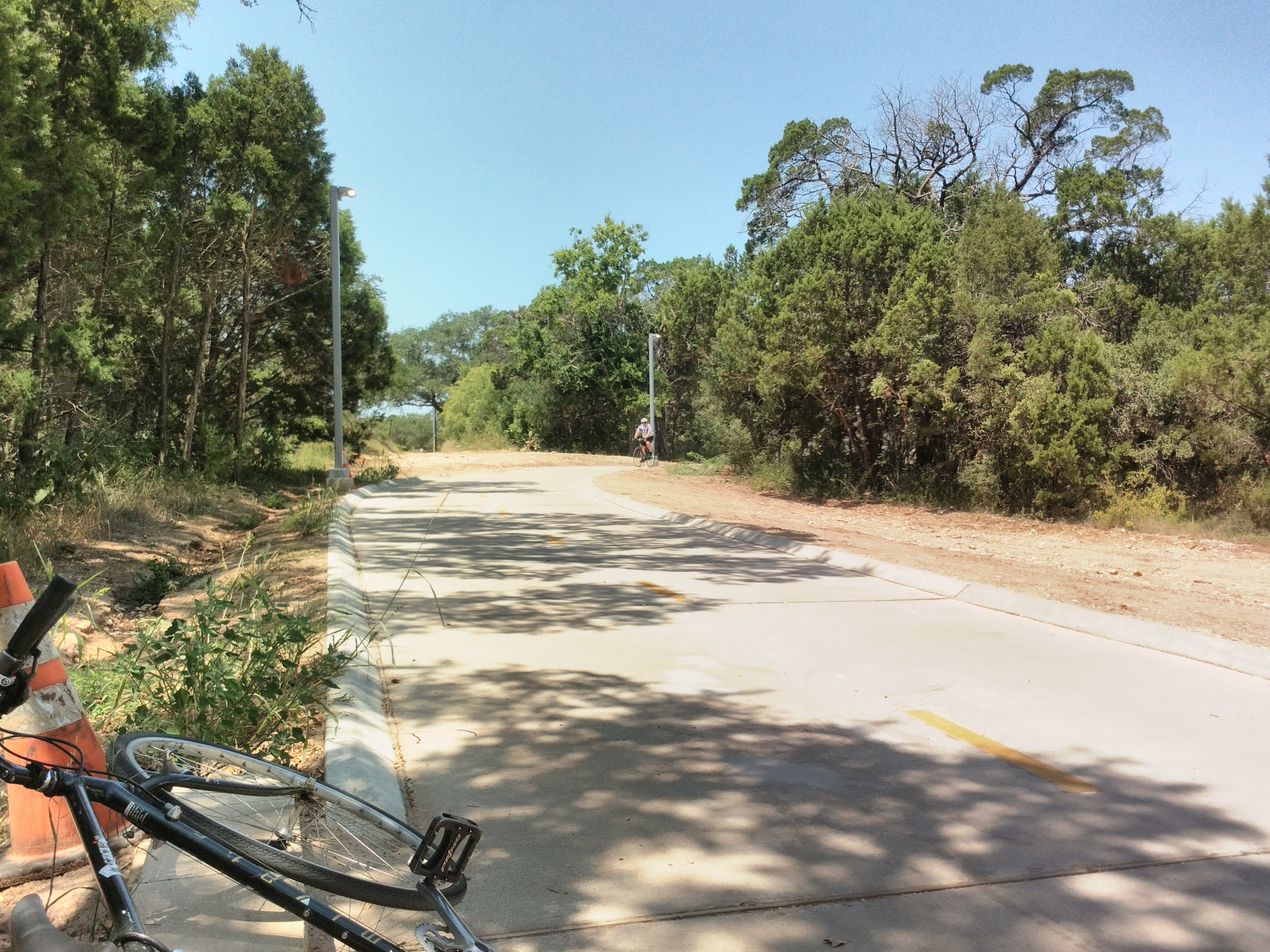 The cycle path climbs away from Barton Creek.